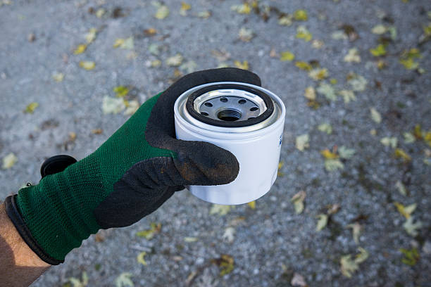 istock Mechanic Getting Ready To Prime SHort Style Oil Filter 492358134