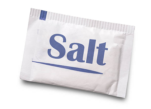 salt Small salt packet isolated on white sachet stock pictures, royalty-free photos & images