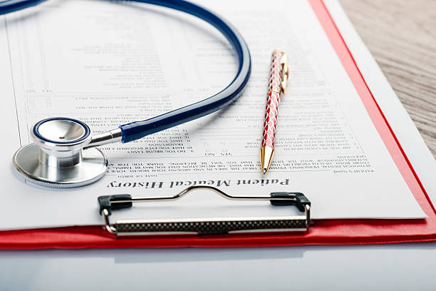 istock medical history with stethoscope and pen 492360774