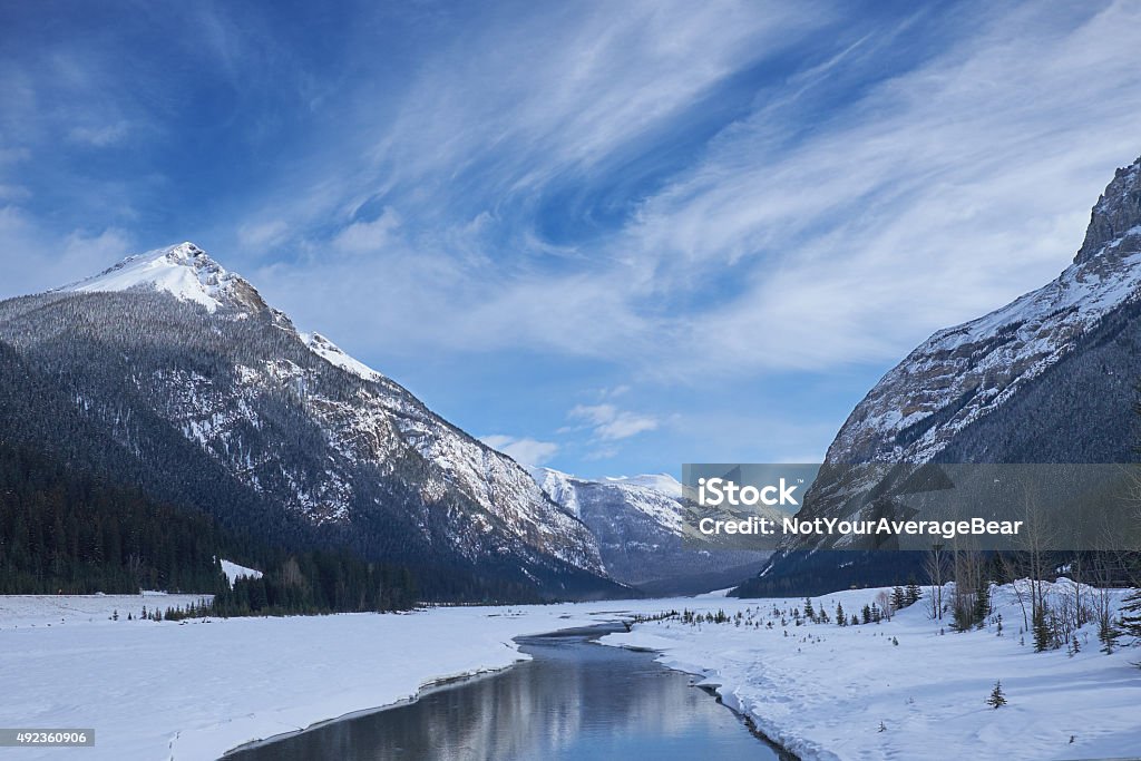 Canada Rocky Mountains with river and reflections Canada Rocky Mountains with river and reflections in winter 2015 Stock Photo