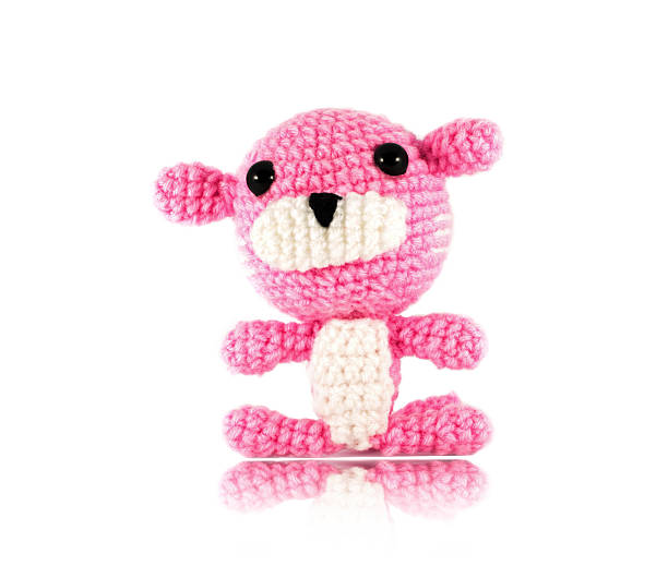 istock handmade crochet pink tiger doll on white background 492360919