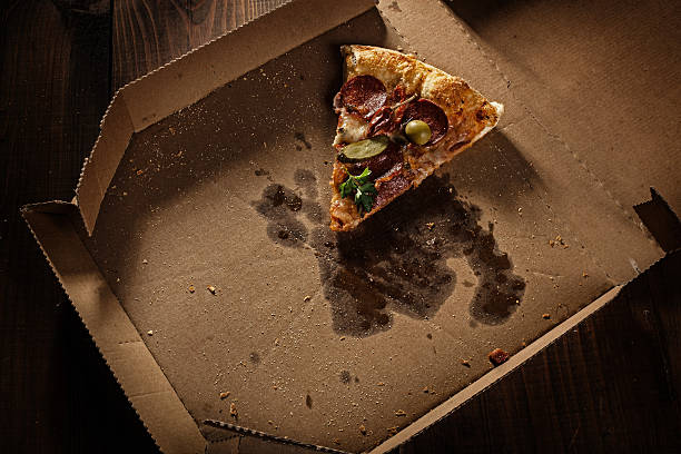 istock pizza slice in the in delivery box 492362832