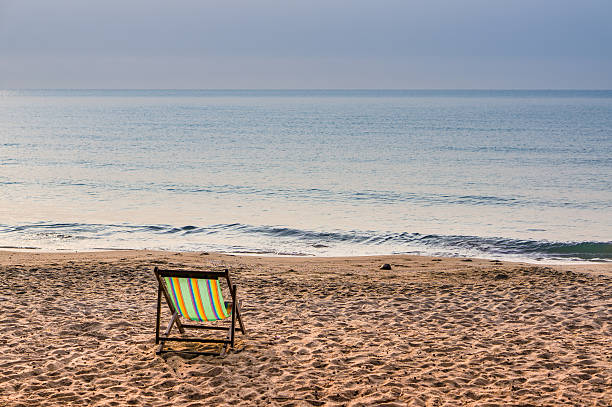 istock daybed on the beach with blue sea, Thailand 492364795