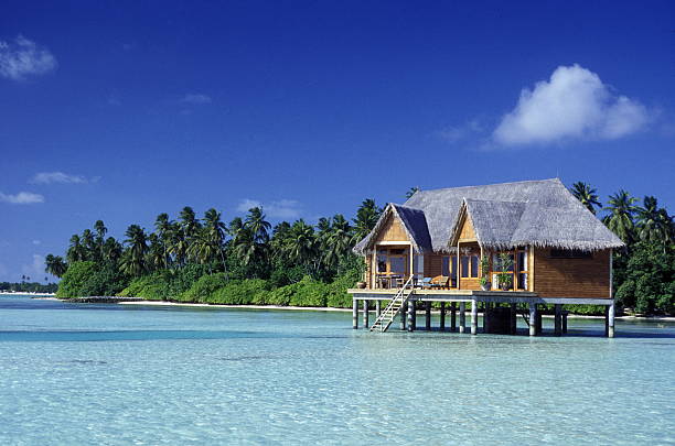 A dream beach on an island in the Maldives in the Indian Ocean.