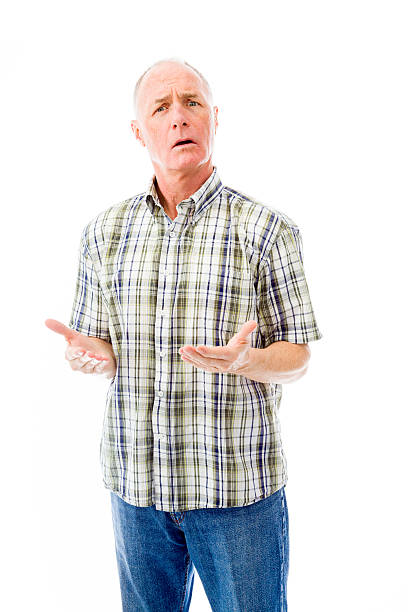 istock Senior man shrugging with raised hands 492366203