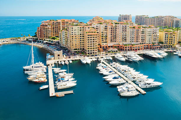 Fontvieille Harbor in Monte Carlo, Monaco seen from above druing a summer day. Fontvieille is the southernmost district of the Principality of Monaco.