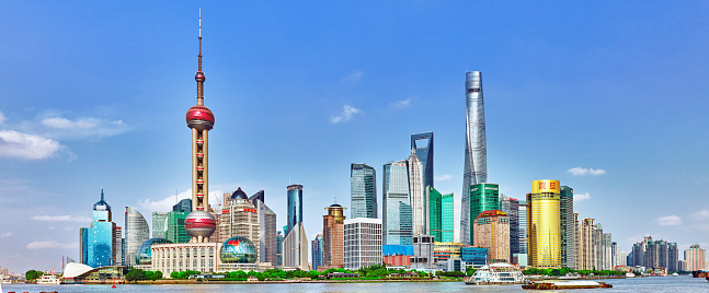 Shanghai, China - May  24, 2015:Beautiful view skyscrapers, waterfront and city building of Pudong, Shanghai, China. Shanghai is the financial capital of the Peoples Republic of China.