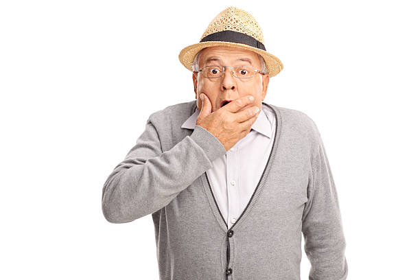 istock Shocked senior holding jhis hand on his mouth 492368732