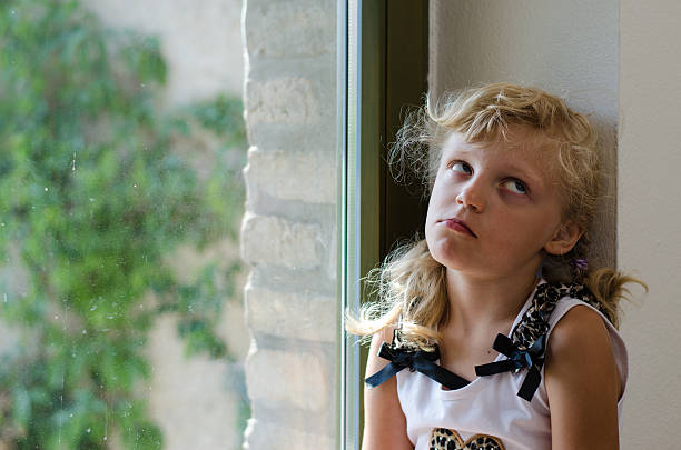 istock bored little girl 492368952