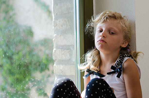 istock bored little girl 492368982