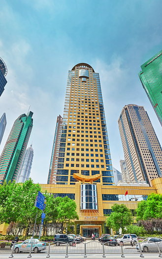 Shanghai, China - May  24, 2015:Beautiful view skyscrapers, waterfront and city building of Pudong, Shanghai, China. Shanghai is the financial capital of the Peoples Republic of China.