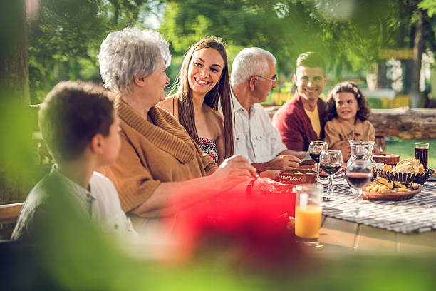 istock Multi-generation family enjoying in a restaurant and communicating. 492369974