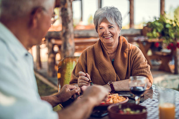 istock Senior woman talking to her husband during a lunch. 492370246