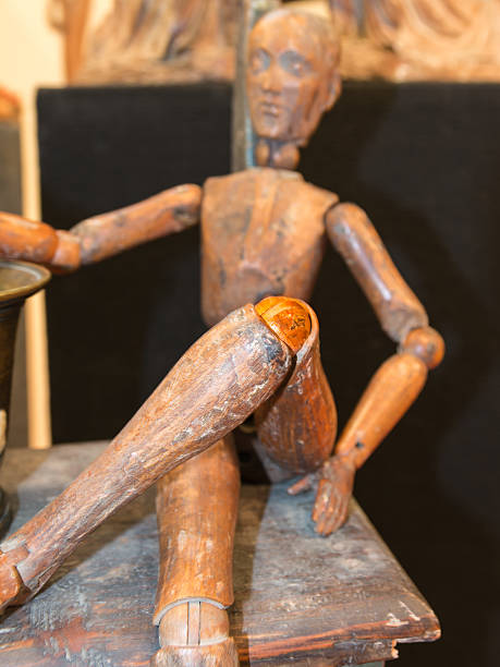 istock puppet knee injury, pain concept 492371634