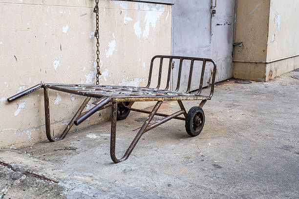 istock Old and dirty metal barrow 492383644
