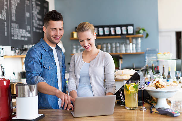 istock Small business owners in coffee shop 492384028