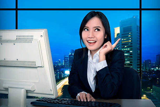 istock Business woman working late 492386338