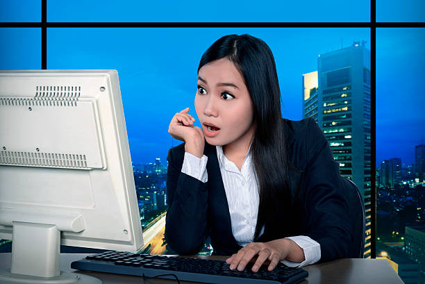 istock Business woman working late 492386616