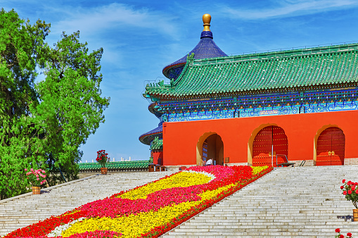 Famous Pagoda Temple near of Heaven in Beijing with flowers lawn.China.Famous Pagoda Temple near of Heaven in Beijing with flowers lawn.China.