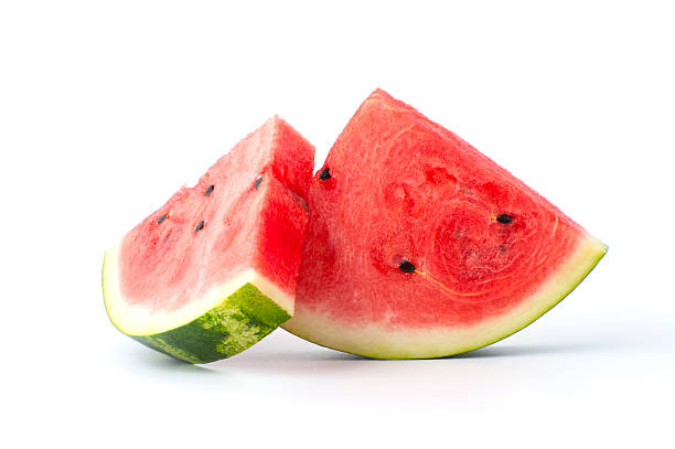 Two slices of watermelon on a white background. stock photo