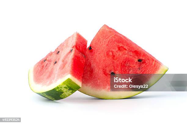 Two Slices Of Watermelon On A White Background Stock Photo - Download Image Now - Watermelon, Slice of Food, Cutting