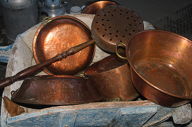 istock copper pots in a wheelbarrow 492394098