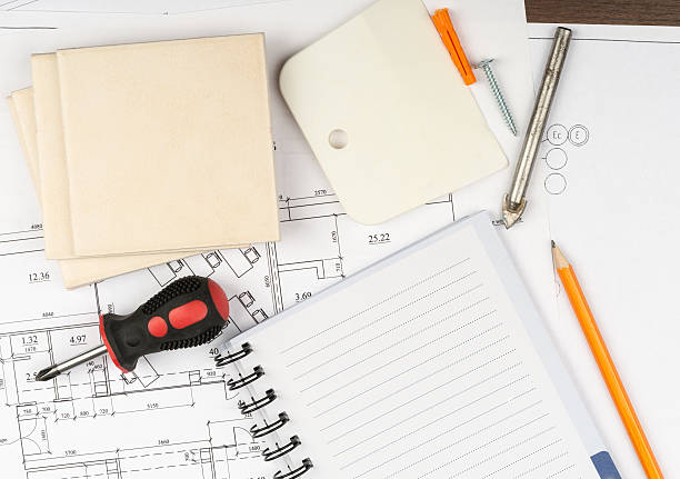 istock Copy book with tiles and screwdriver 492394932