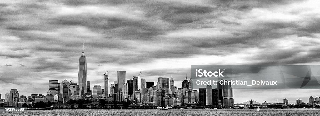 Lower Manhattan, Ellis Island and Brooklyn bridge from Jersey City Black and white panoramic view of Lower Manhattan, Ellis Island and Brooklyn bridge from Jersey City. 2015 Stock Photo