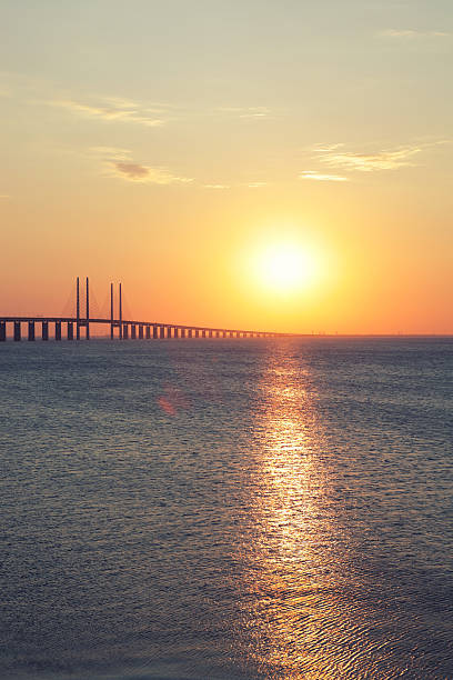 istock Oresundsbron bridge at sunset 492395802