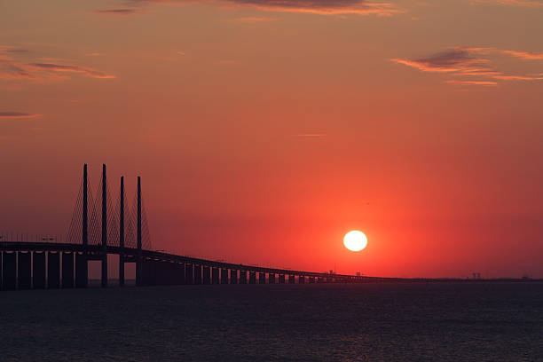 istock Oresundsbron bridge at sunset 492395904