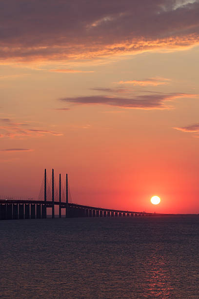 istock Oresundsbron bridge at sunset 492395934