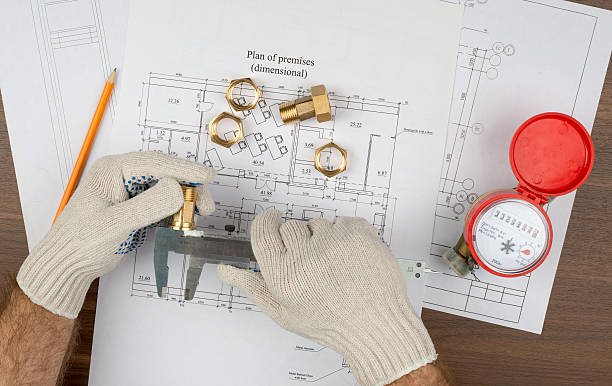 istock Mans hands in gloves holding trammel 492397186