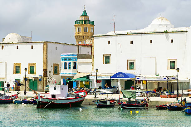 Bizerte, Tunisia - May 08, 2007: Unknown people are resting in resort town Bizerte in Tunisia, Africa