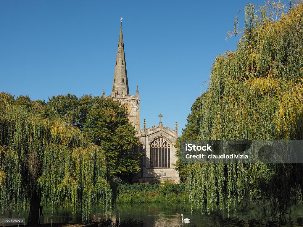 Holy Trinity church in Stratford upon Avon Holy Trinity church seen from River Avon in Stratford upon Avon, UK 2015 Stock Photo