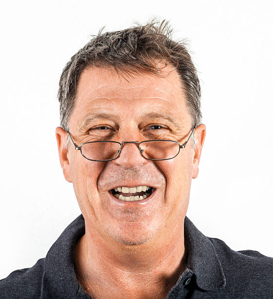 istock handsome smiling man in black leisure shirt 492399077