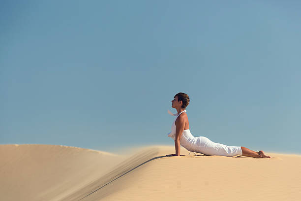 istock Yoga meditation on the beach, wellness concept 492399213