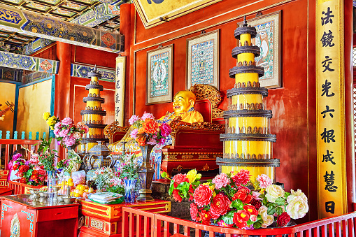 Interior view of Yonghegong Lama Temple.Beijing. Lama Temple is one of the largest and most important Tibetan Buddhist monasteries in the world.Inscription means(translation)-Pavilion of Ten Thousand Happinesses\