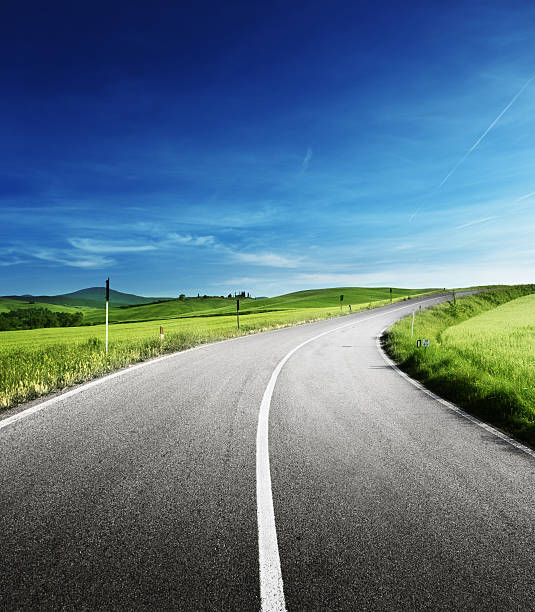 istock asphalt road in Tuscany, Italy 492399520