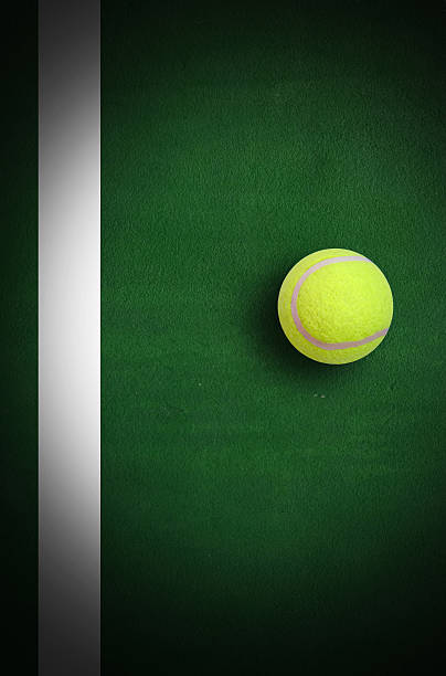istock Tennis ball on court 492401317