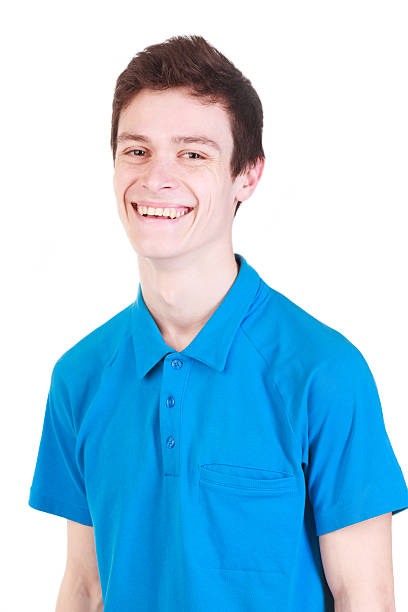 istock Young handsome smiling man in blue t-shirt isolated on white 492401883