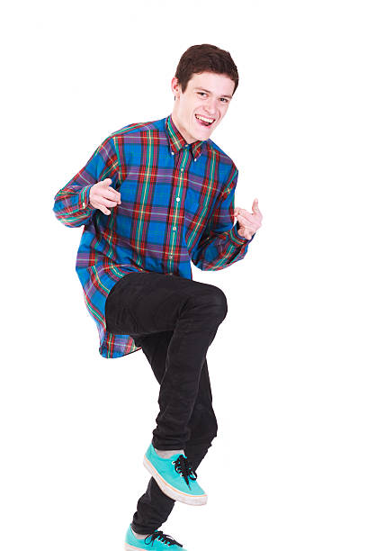 istock Young handsome man looking like rockstar on white 492402053