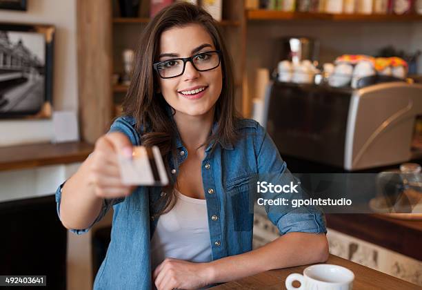 Smiling Woman Paying For Coffee By Credit Card Stock Photo - Download Image Now - Adult, Adults Only, Beautiful People