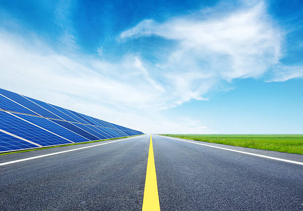 Highway and solar panels stock photo