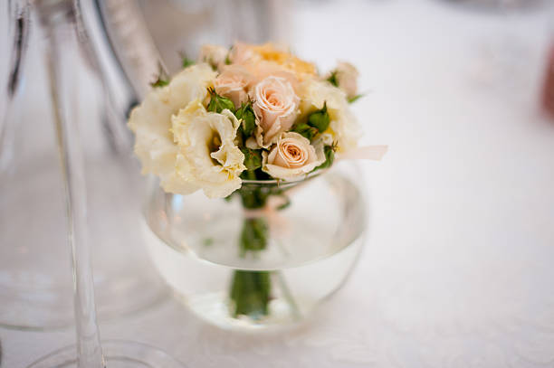 istock pink roses bouquet in glass vase 492414016