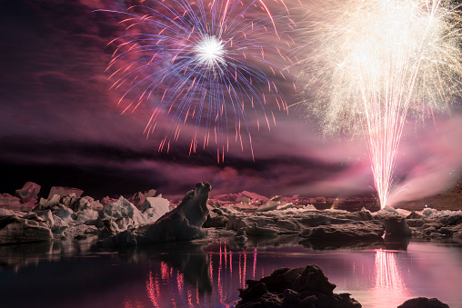 Firework show among the icebergs, ice lagoon Jokulsarlon, Iceland