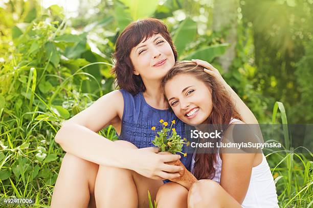 Mother And Her Grown Up Daughter Stock Photo - Download Image Now - Aunt, Niece, Daughter