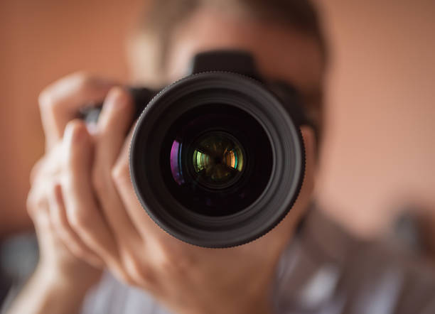 istock Photographer doing self portrait. 492421654