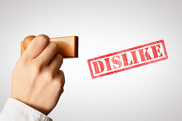 Dislike Hand Holding Stamp (Dislike) handstamp stock pictures, royalty-free photos & images