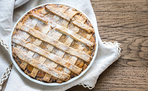 istock Pumpkin pie on the wooden background 492422894