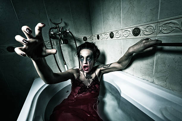 Halloween theme.Scary girl in bath.